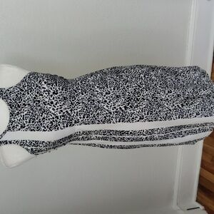 Athleta Zimbabwe High Neck Swim Dress in an anima allover leopard print. 